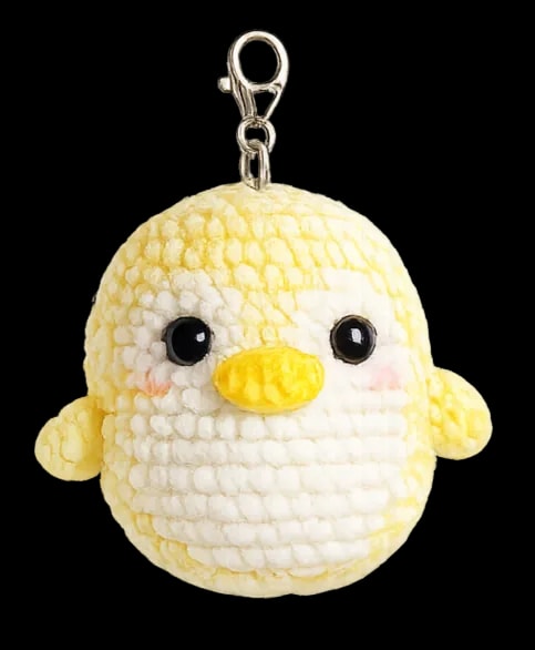 Pink fluffy crochet penguin reference